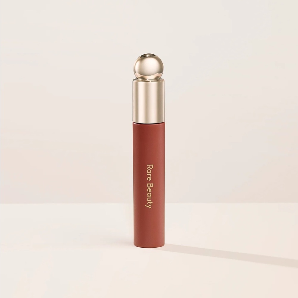 Rare Beauty Lip Oil in honesty NEVER USED